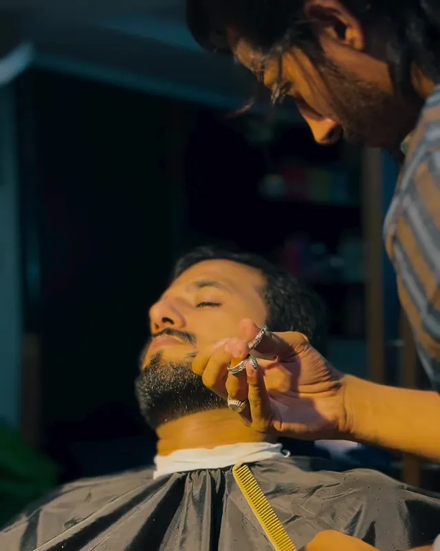 Close-up of a beard being trimmed